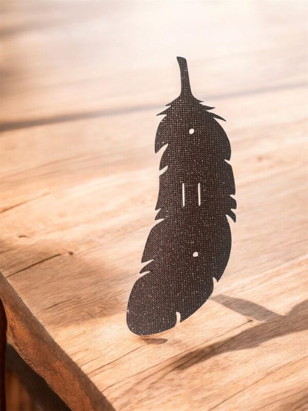 Attache câble plume