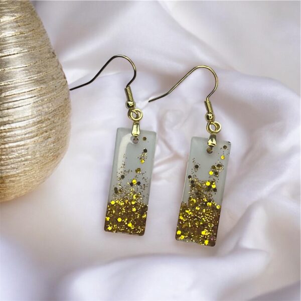 Boucles d'oreilles R12 degradées de paillettes dorées